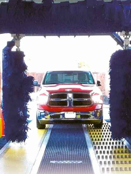 Red truck on a neutral belt conveyor