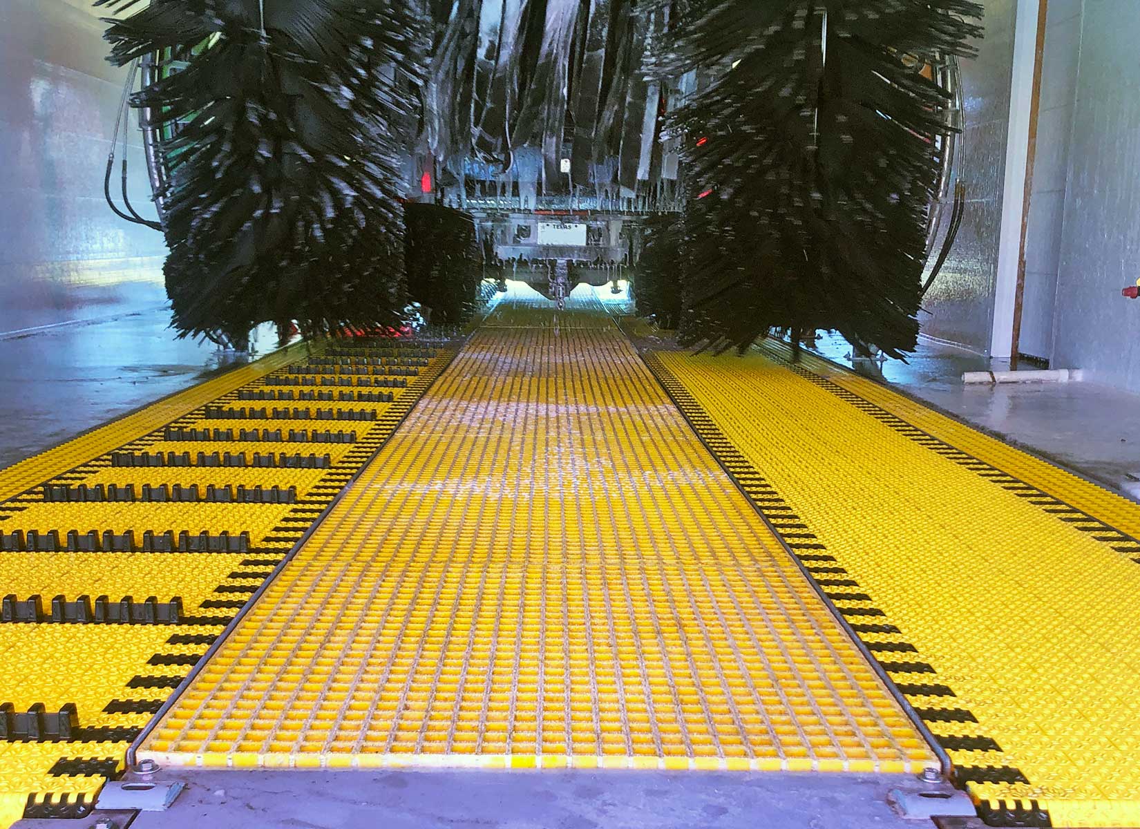 close up of a belt conveyor inside a car wash